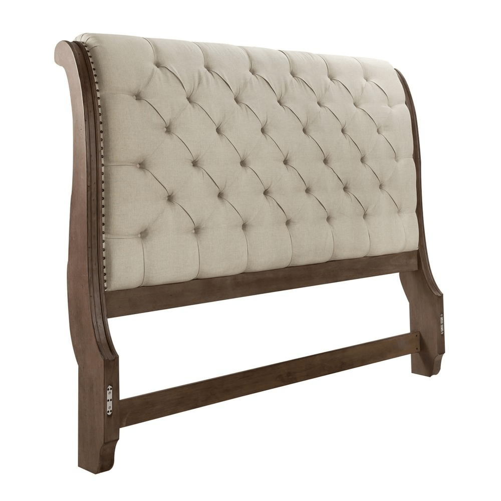 Americana Farmhouse queen sleigh bed tufted headboard with linen upholstery and nailhead accents in dusty taupe finish.