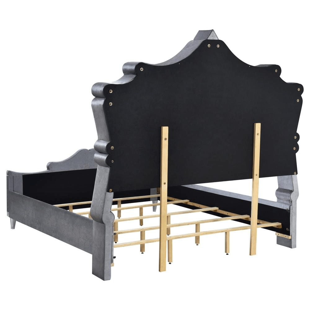 Rear view of Antonella 5-Piece Eastern King Upholstered Tufted Bed Frame in Grey Velvet featuring a wrap-around shelter headboard.