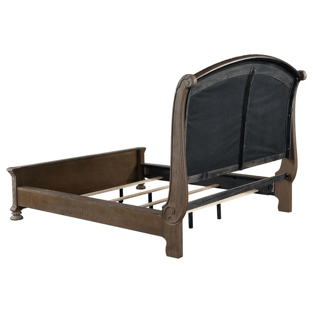 Emmett 5-piece Eastern King bed frame with arched headboard in walnut finish and traditional design features.
