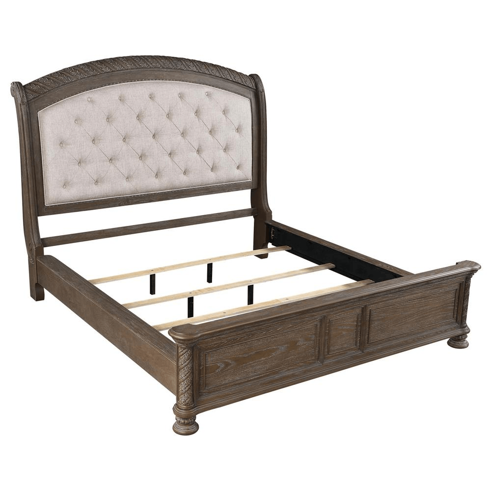 Emmett queen walnut bed with arched button-tufted headboard and faux wood carved columns.