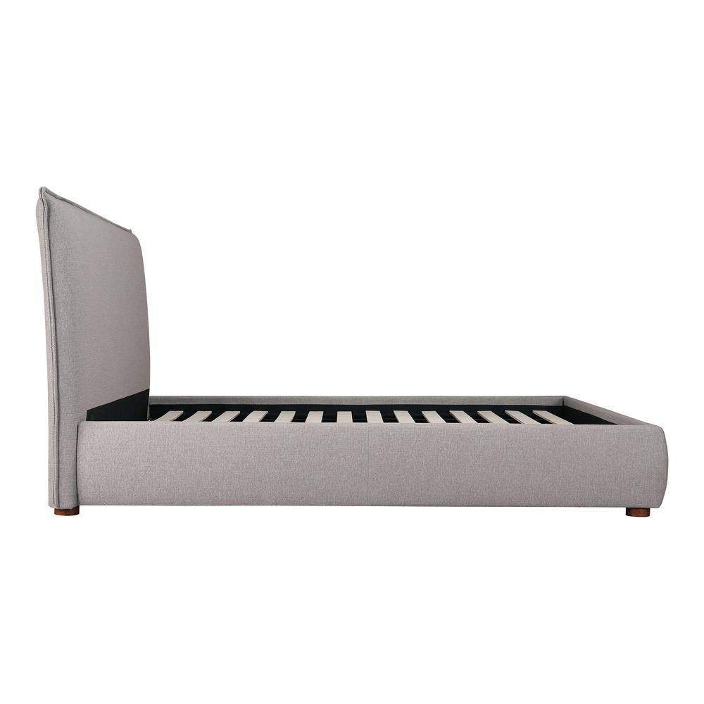 Luzon King Bed with padded headboard, solid pine and engineered wood frame, upholstered in soft linen-blend fabric, side view.